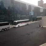 Fleet Werner Charter Buses Parked in front of building